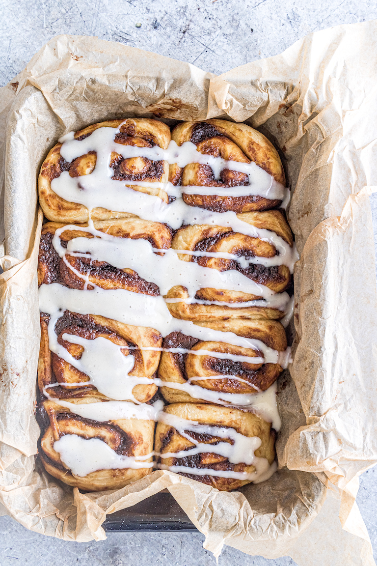 top down view of baking pan filled with the finished nutella pumpkin cinnamon rolls
