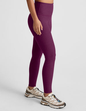purple high-waisted midi length leggings. 