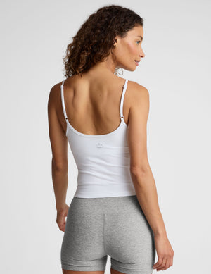 white midway length tank with adjustable spaghetti straps. 