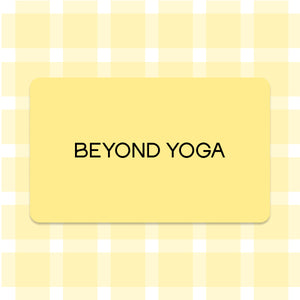 Yellow card with 'BEYOND YOGA' text on a yellow and white checkered background