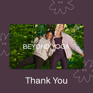 Two women in a yoga pose with 'Beyond Yoga' text on a purple background